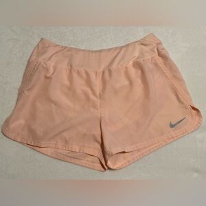 Nike Women's Coral Dri Fit Tempo Mid-Rise Brief Lined Running Shorts